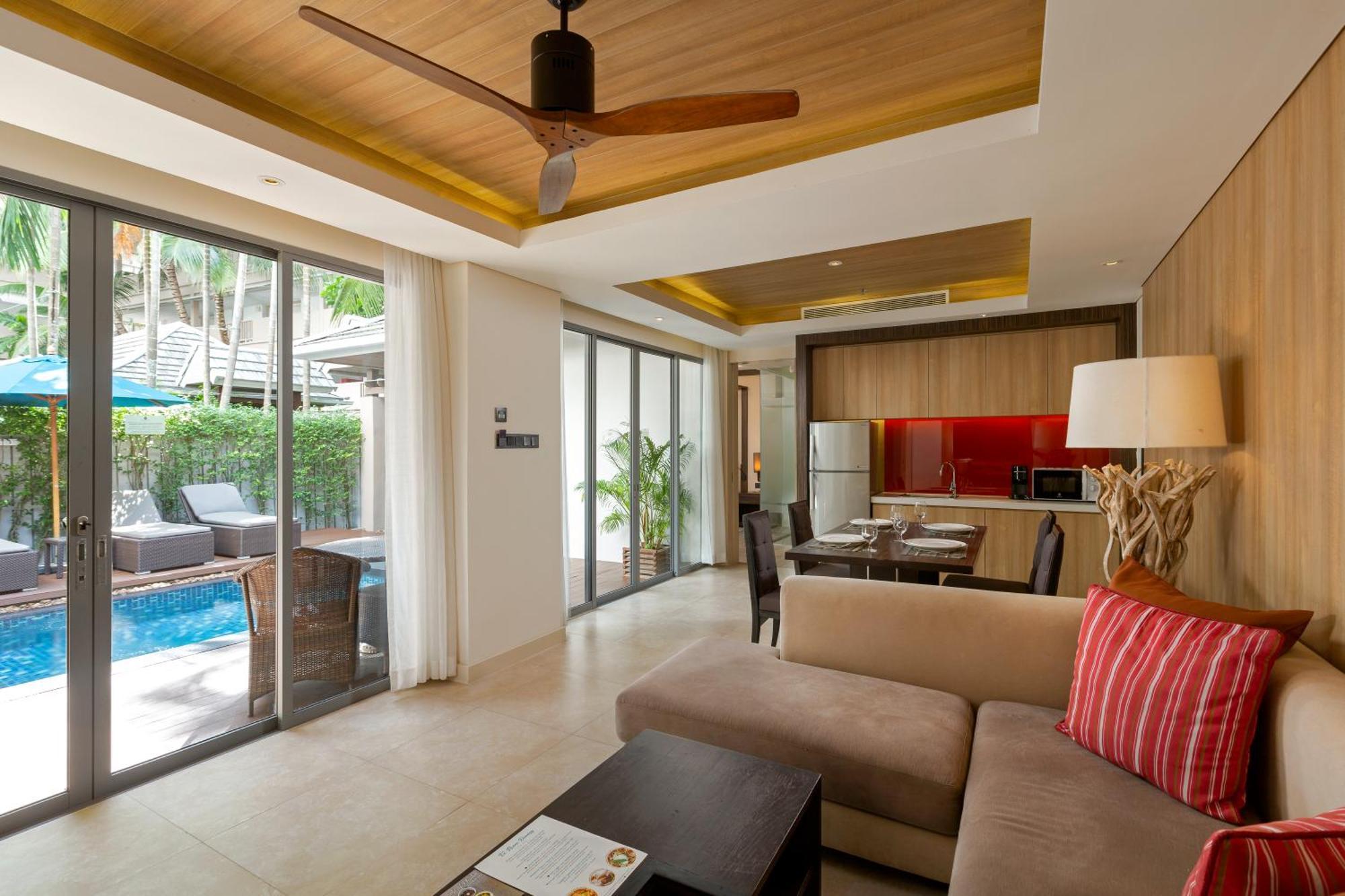 Grand Mercure Phuket Patong Exterior foto Living room of a pool villa at The Village